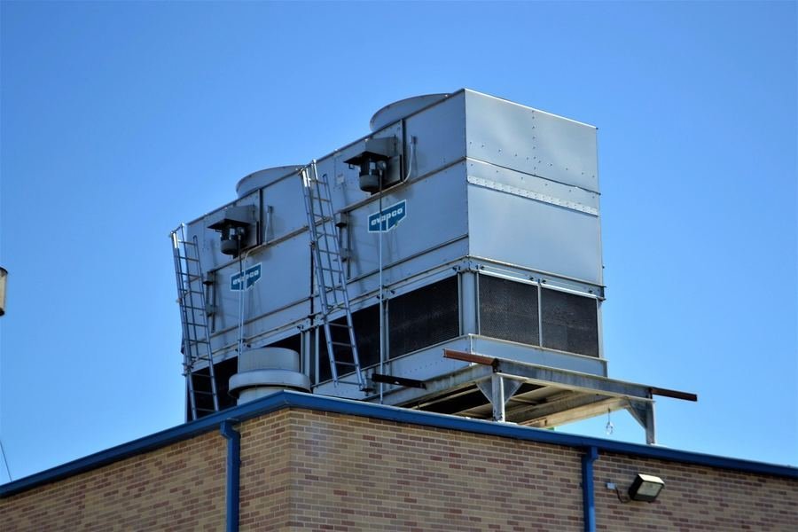 Preventive maintenance on a commercial rooftop HVAC unit