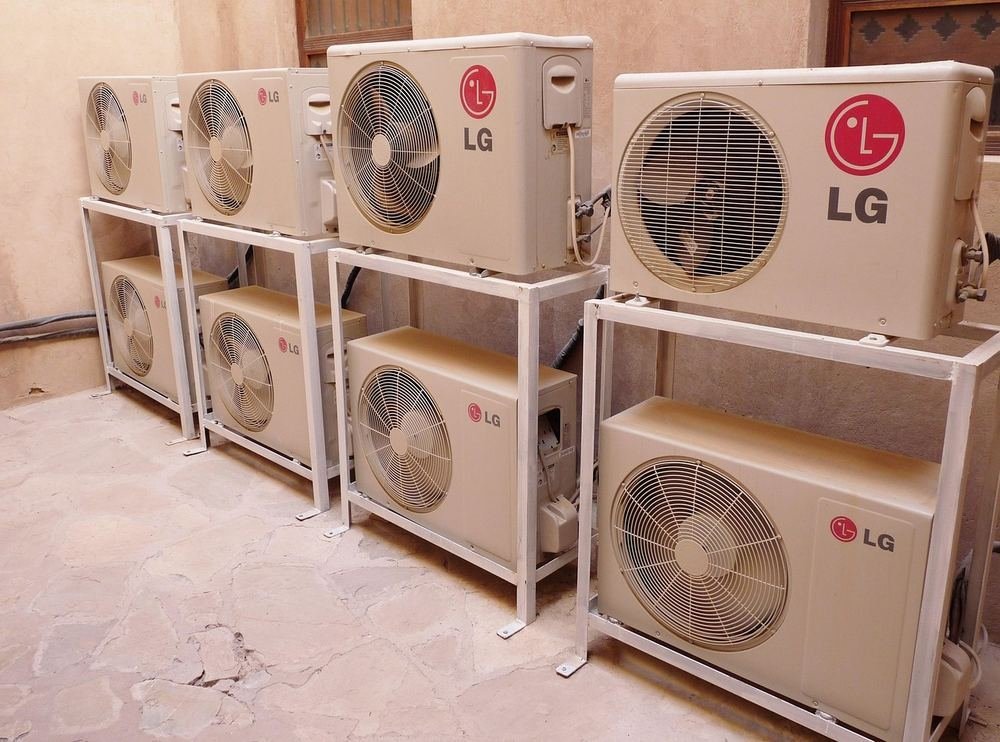 Residential air conditioning condenser units outside a home